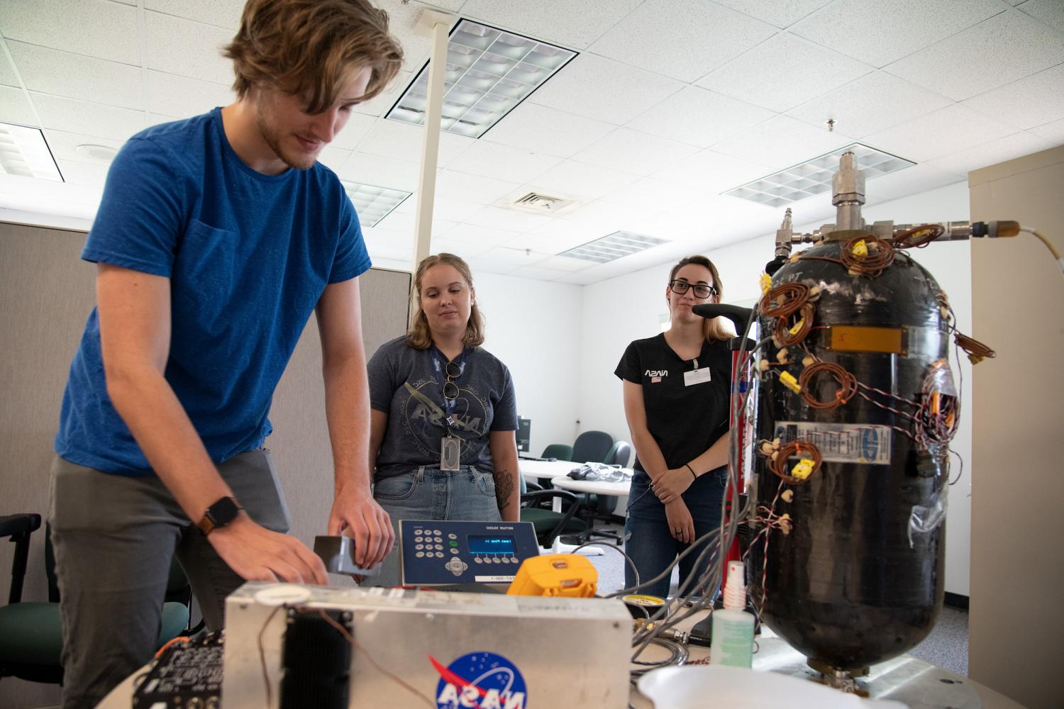 Carthage interns working on MPG at NASA Kennedy Space Center.